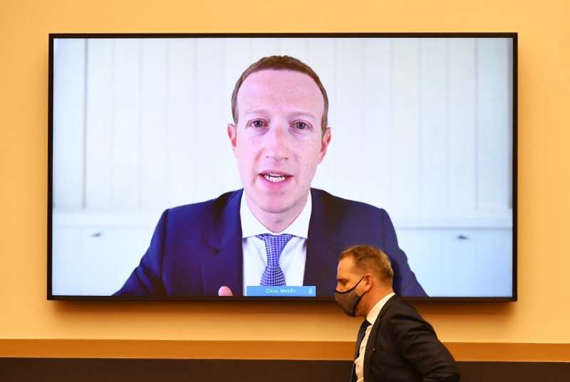 Facebook CEO Mark Zuckerberg discussed the social network's quarterly results a day after his testimony by video, seen here, bef