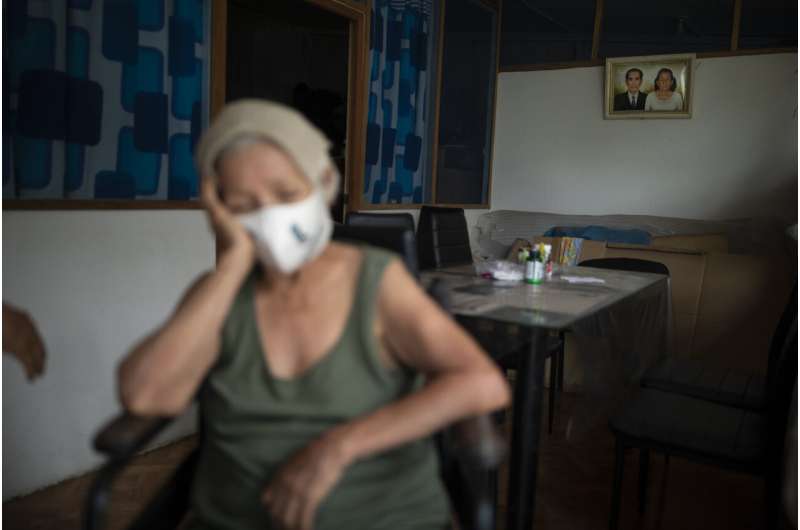 In hard-hit Peru, worry mounts over both COVID-19 and dengue