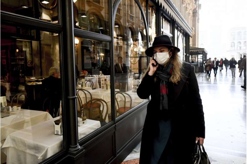 Italy tries to contain virus as isolated towns hunker down