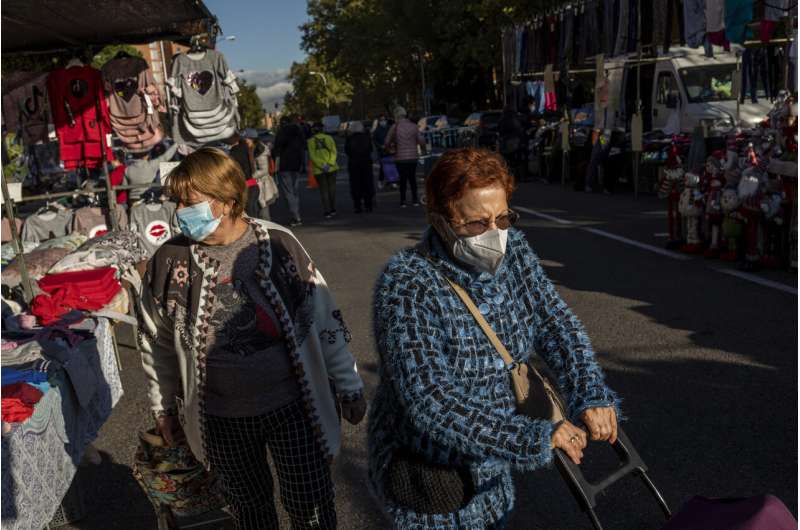 More masks, less play: Europe tightens rules as virus surges