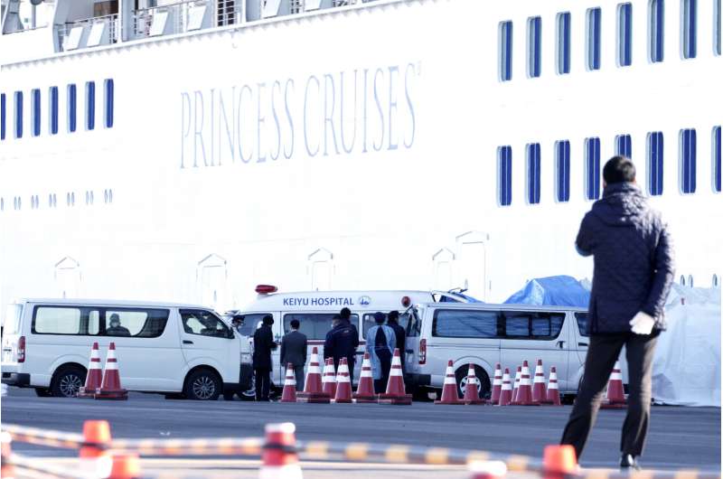 10 more sick with virus on one of two isolated cruise ships