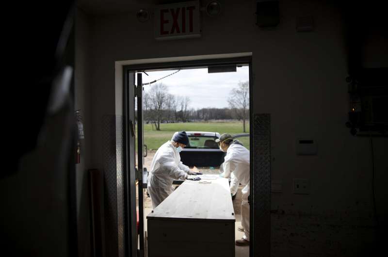 Cemetery races to keep up as New York virus deaths mount