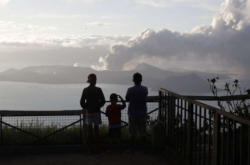 Philippine volcano trembles more, spews lava half-mile high