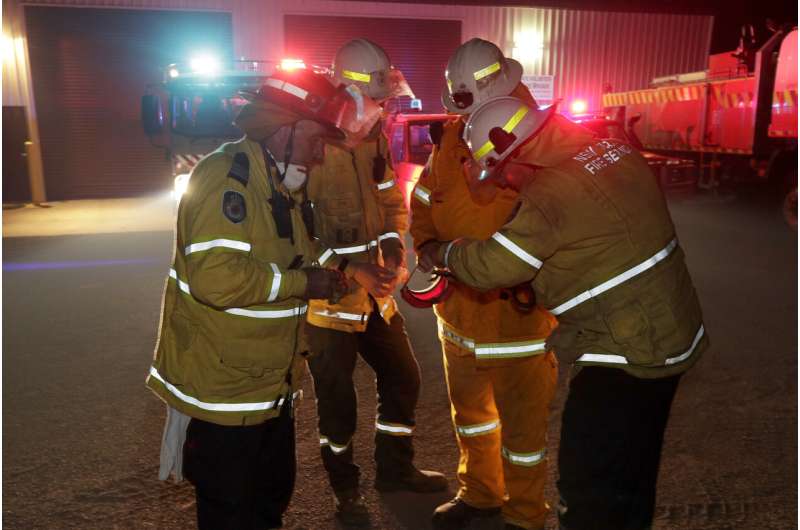 2 Aussie wildfires merge into inferno; man seriously burned