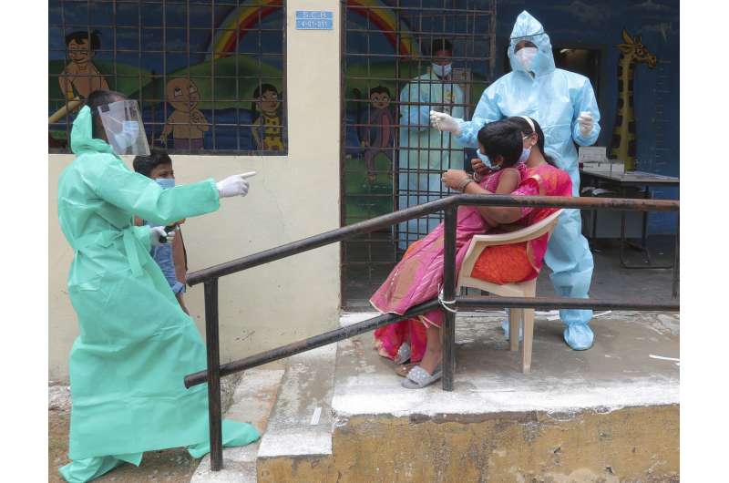 India's virus caseload tops 3 million as disease moves south
