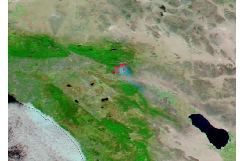 NASA's Aqua satellite shows two views of the apple fire