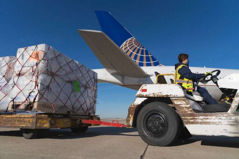 Pfizer vaccines from Belgium are unloaded at Chicago's O'Hare International Airport in early December
