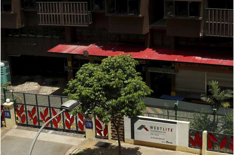 Singapore battles virus hotspots in migrant workers' dorms