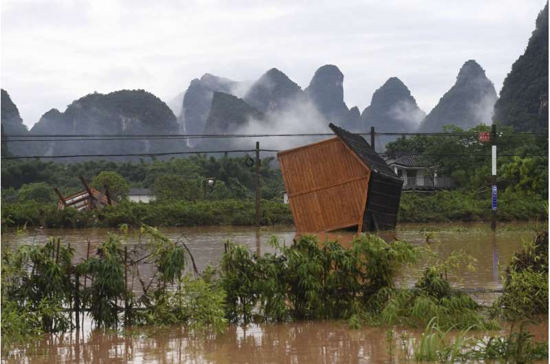 South China cleaning up from floods but more rain on the way