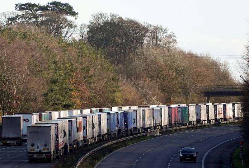 Thousands of trucks were backed up on motorways in southern England on Christmas Day even after France reopened border crossings