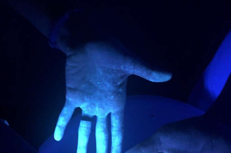 FAU  Ultraviolet Light Exposes Contagion Spread from Improper PPE Use