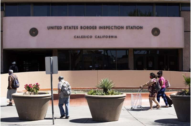 Virus cases spike in California county on Mexican border
