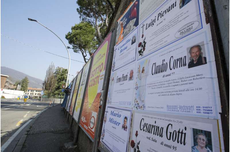 Italy's virus epicenter grapples with huge toll, some hidden