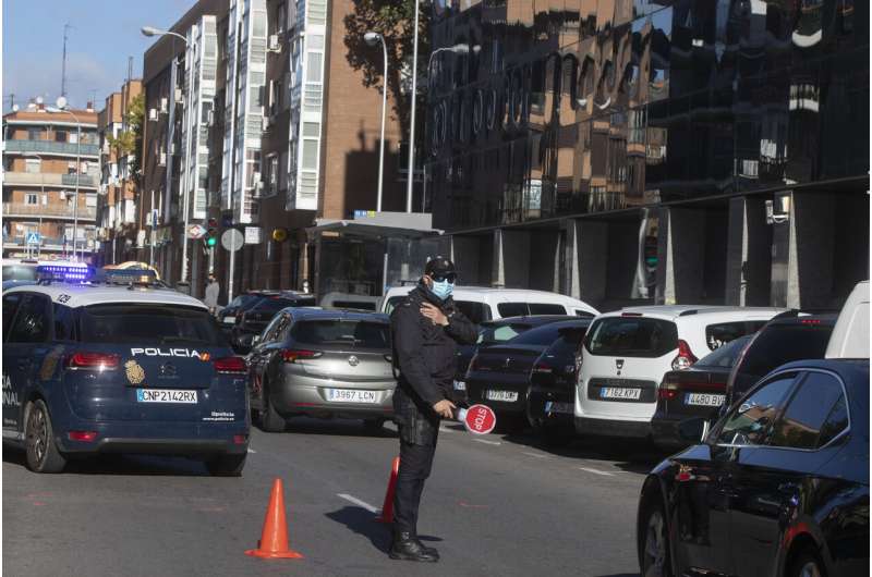 Madrid starts partial virus lockdown amid political scuffle