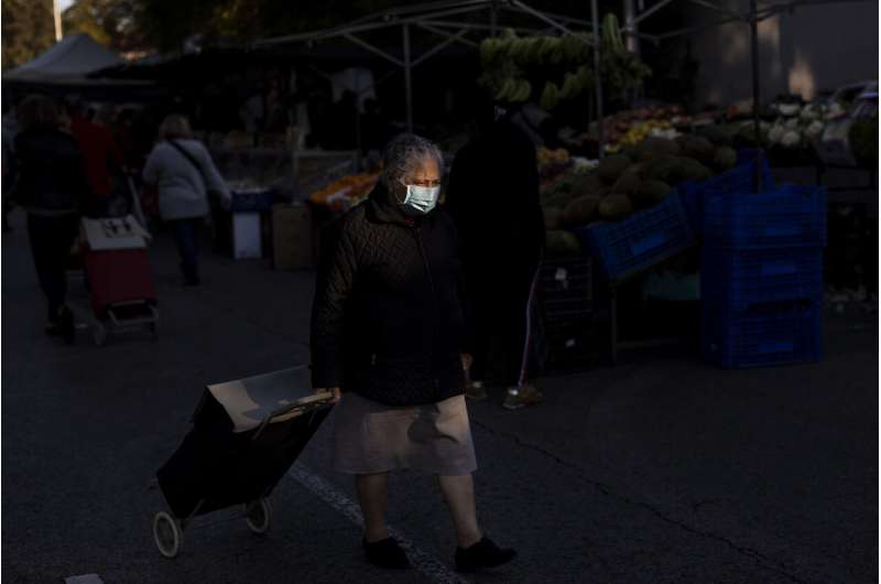 More masks, less play: Europe tightens rules as virus surges