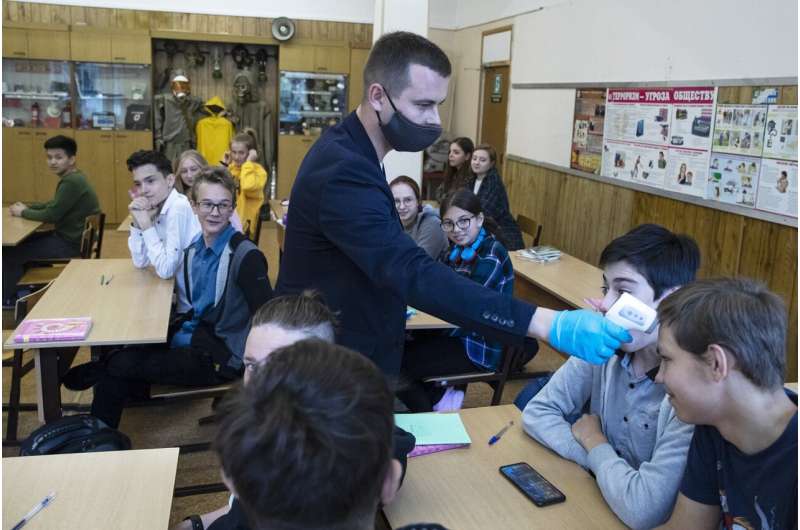 Russian schools reopen with masks, class limit precautions