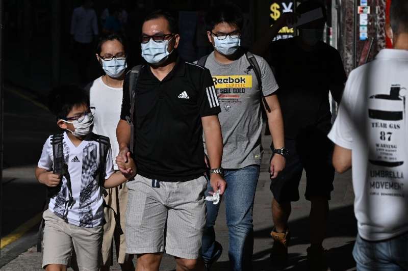 Authorities in Hong Kong made it mandatory to wear masks in public from this week and unveiled the city's toughest social distan