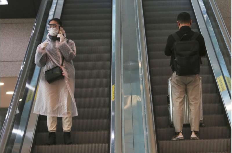 Desperate to stop virus' spread, countries limit travel