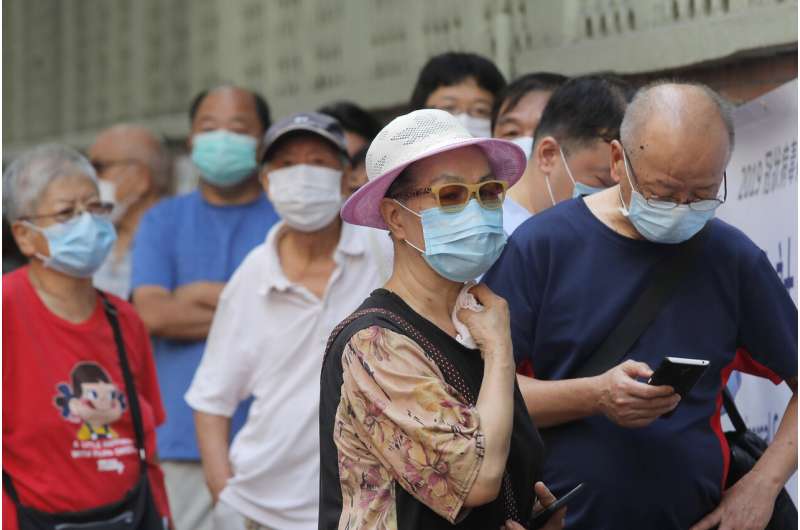 Hong Kong begins mass-testing for virus amid public doubts