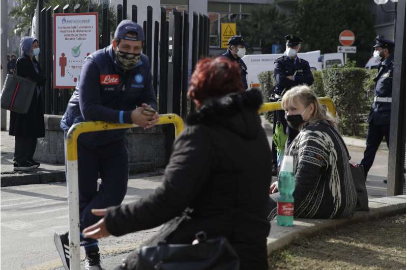 Italy extends partial lockdown as Naples hospitals struggle