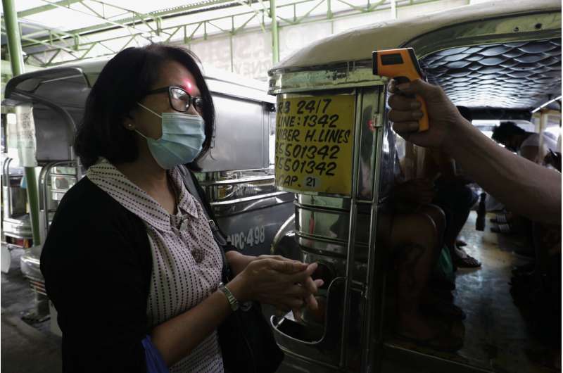 Philippines virus cases top 100,000 in 'losing battle'