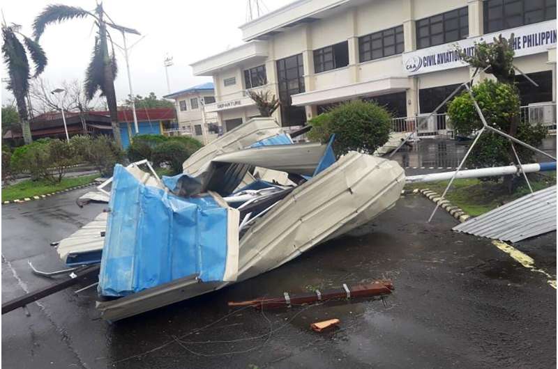 Powerful typhoon lashes Philippines, killing at least 10
