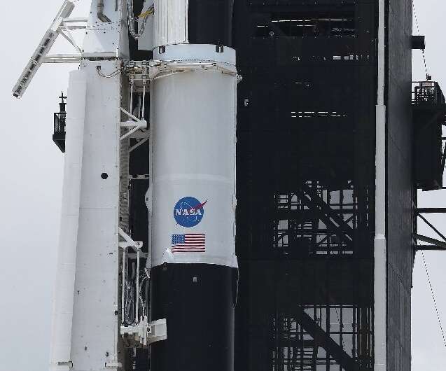 The Crew Dragon capsule atop SpaceX's Falcon 9 rocket