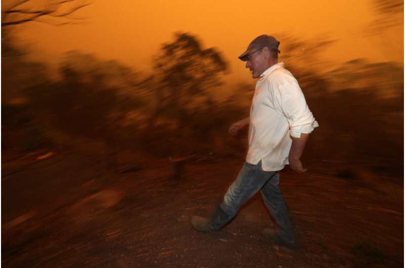 2 Aussie wildfires merge into inferno; man seriously burned