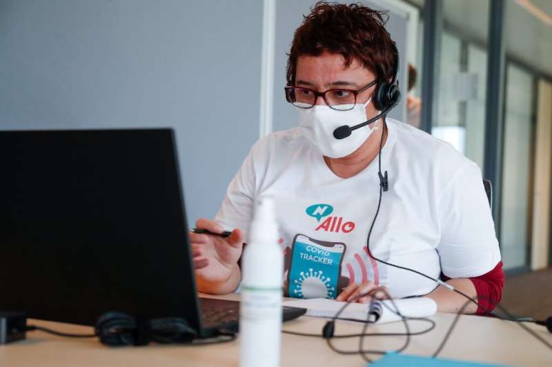 Contact tracing for infectious diseases has been traditionally done by people in call centers such as this one  in Brussels in a