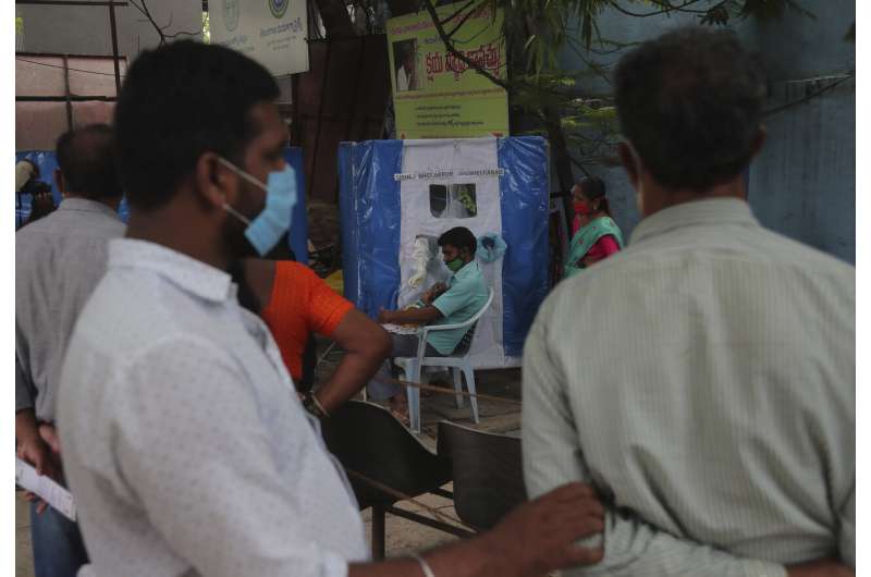 India's virus caseload tops 3 million as disease moves south
