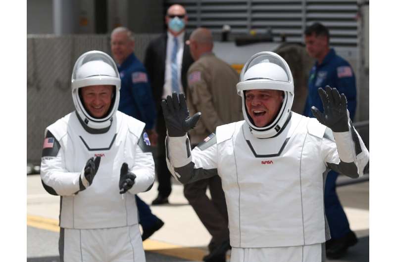 NASA astronauts Bob Behnken (R) and Doug Hurley (L)