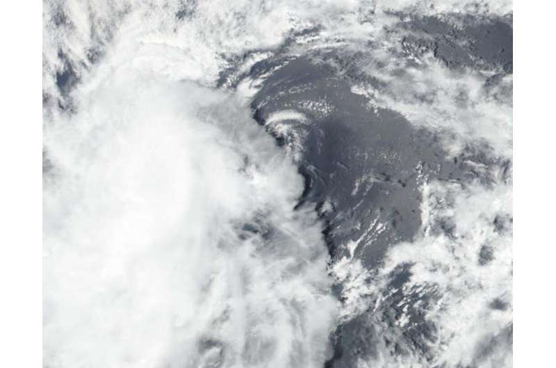 NASA finds wind shear making Tropical Depression 10E struggle