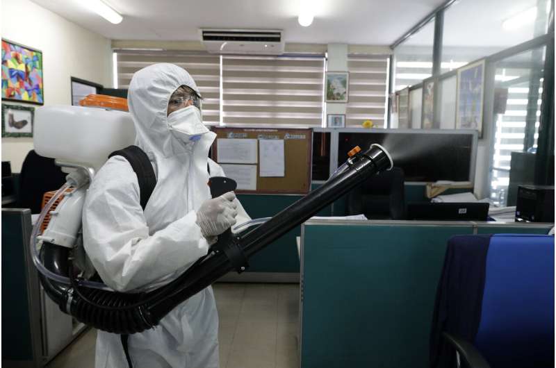 Pandemic increasingly takes over daily lives, roils markets