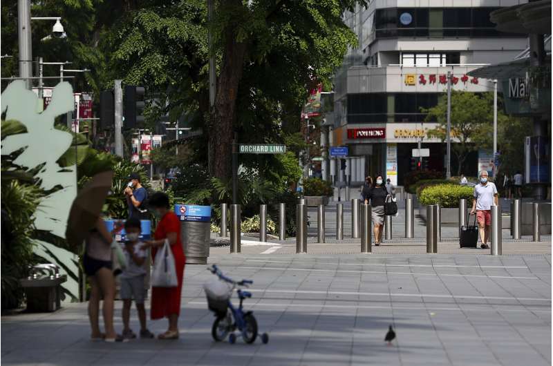 Singapore battles virus hotspots in migrant workers' dorms