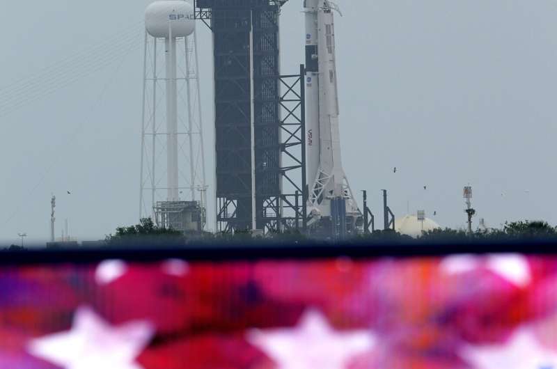 Stormy weather puts damper on SpaceX's 1st astronaut launch