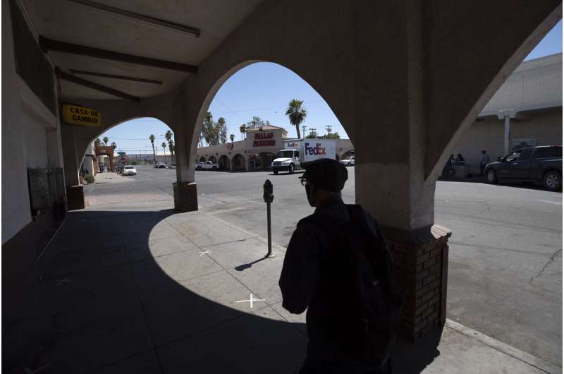 Virus cases spike in California county on Mexican border