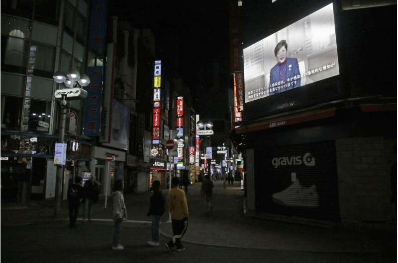 Many Japanese defy appeals to stay home to curb virus