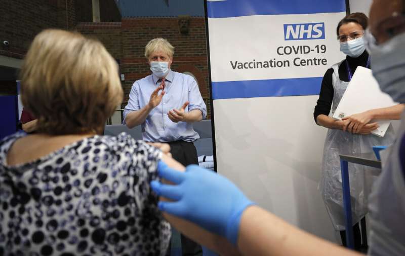 ‘Route out’ of pandemic: UK gives 1st COVID-19 vaccine doses