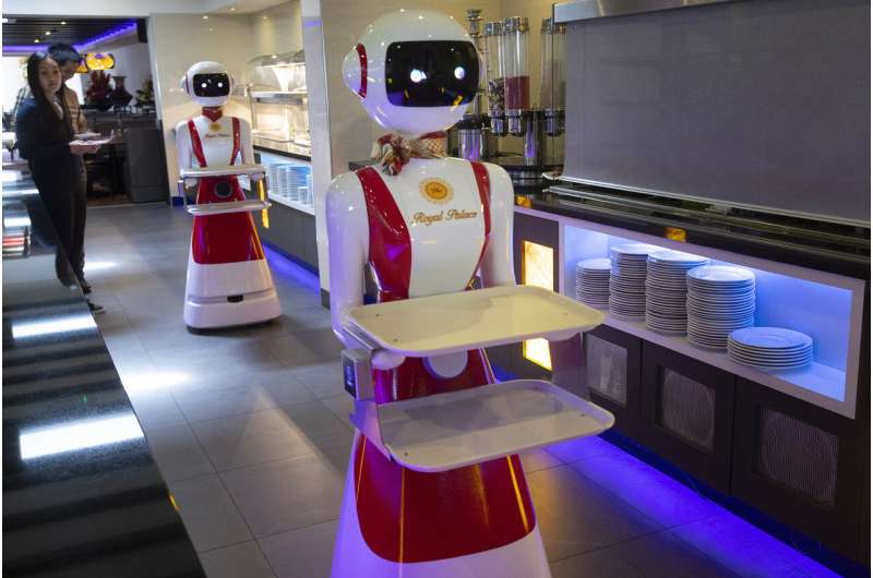 Hello and welcome: Robot waiters to the rescue amid virus