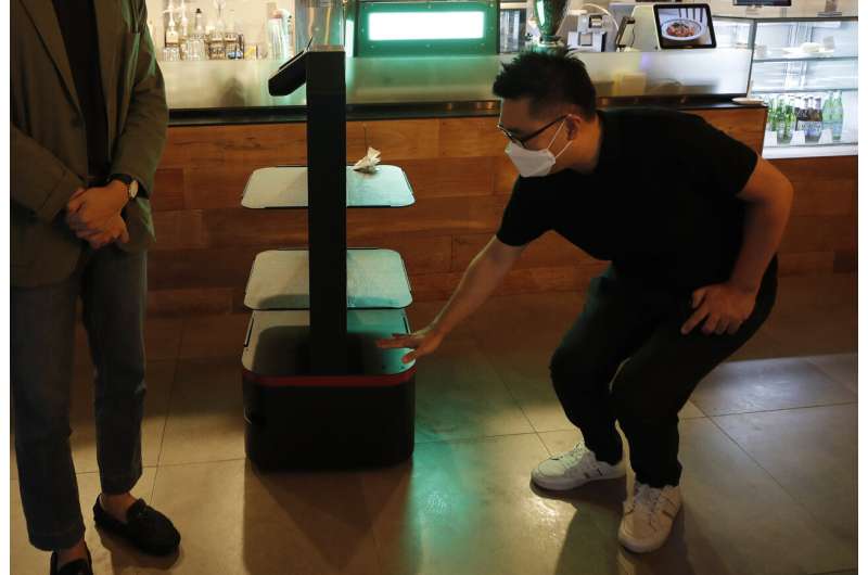 AI Robots serve restaurant customers in South Korea