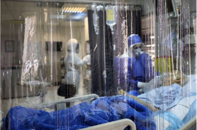 Iran orders troops to fight coronavirus outbreak as 77 dead