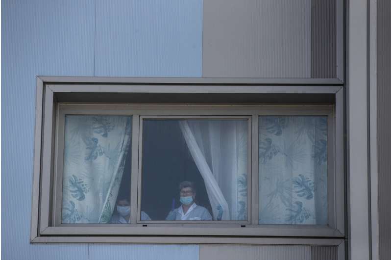 Wuhan ends lockdown as health workers buckle under strain