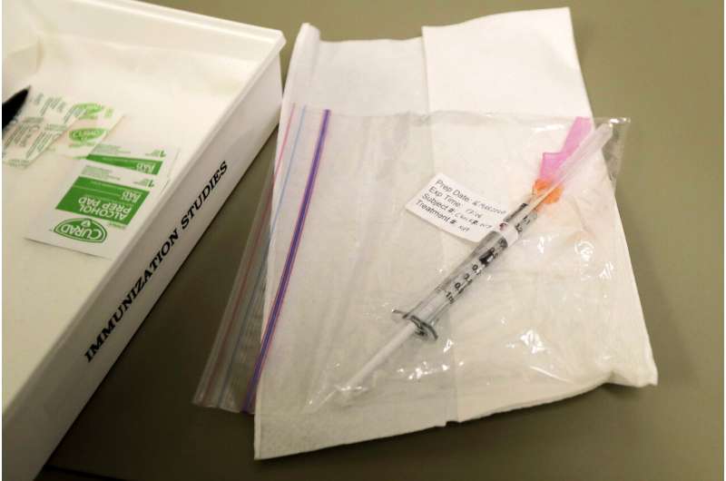 Coronavirus vaccine test opens with 1st doses