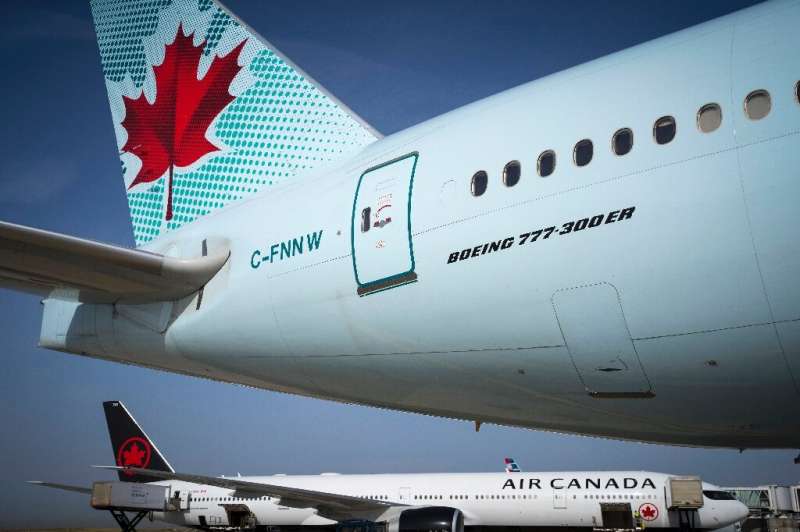 Air Canada says it will rehire furloughed employees under a government relief program