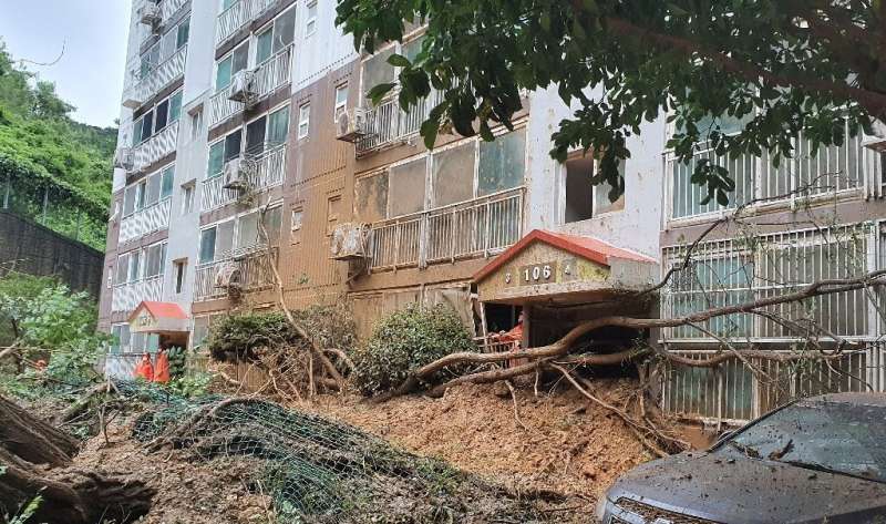 A landslide hit this apartment building in Geoje, South Korea after slamming southern Japan with record winds and heavy rains