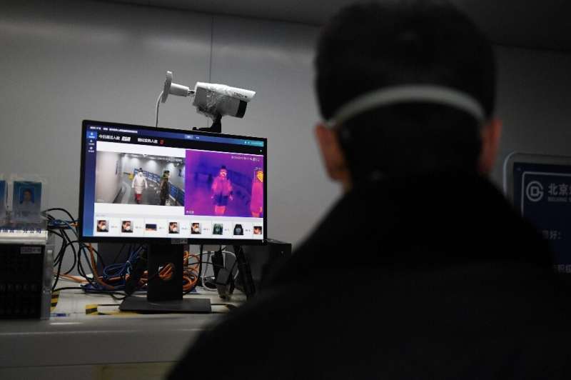 由MegVII屏幕通勤者开发的AI驱动系统在北京的地铁站发烧