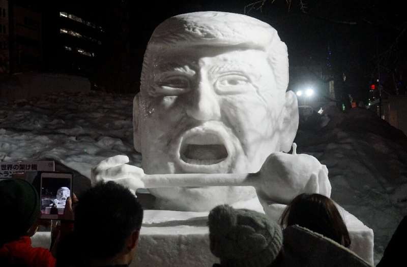 An ice sculpture of US President Donald Trump featured during the 2017 Sapporo Snow Festival, but this year organisers are havin