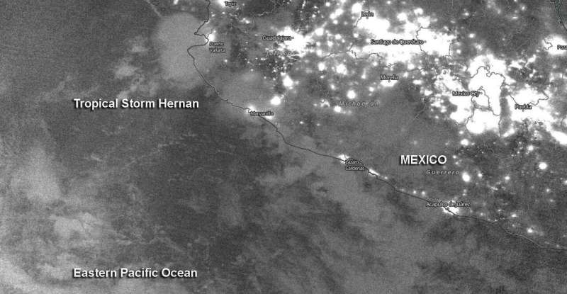 A nighttime view of Tropical Storm Hernan from a NASA-NOAA satellite