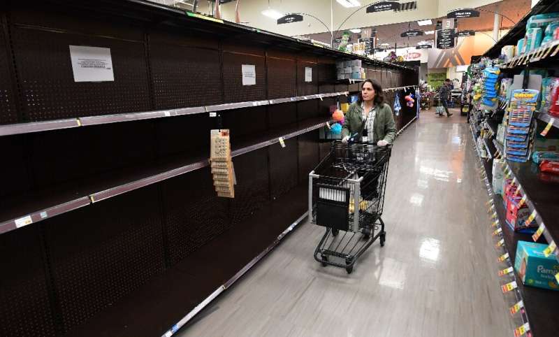 Bare shelves are now normal at supermarkets Instacart driver Monica Ortega shops at in the San Fernando Valley