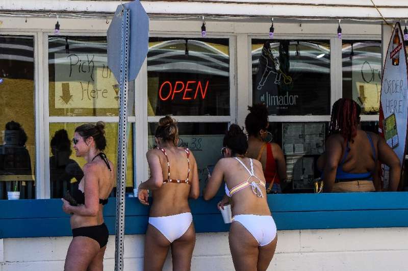 Beachgoers crowded the shores in the US state of Georgia after lockdown restrictions were lifted there